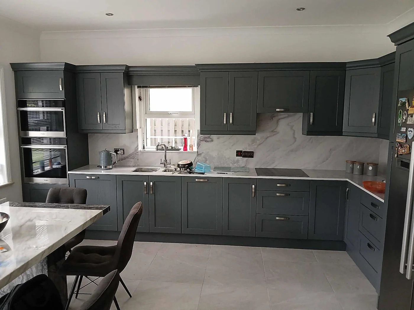 Dark modern fitted kitchen by Downes Fitted Furniture