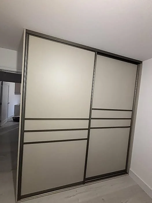 Sliding wardrobe doors fitted by Downes Fitted Furniture